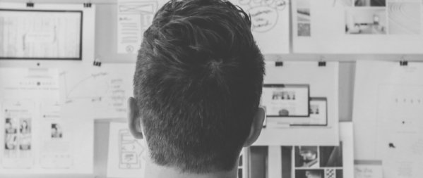 Back of student head who is reading a wall of data